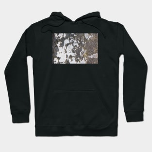 Grey tones on a scratch eroding surface. Hoodie